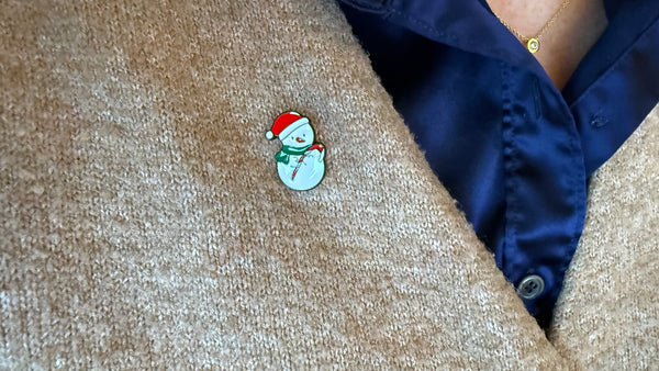 Sneeuwpop pin