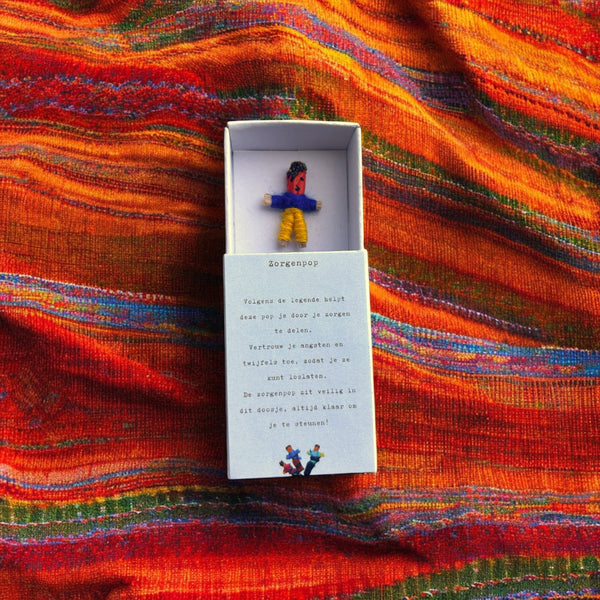 Doosje met zorgenpop