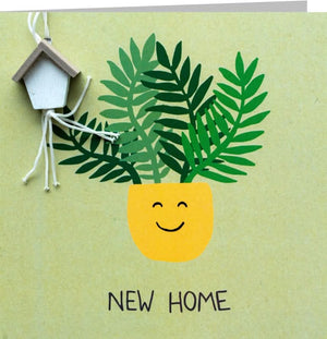 Wenskaart met gelukspoppetje new home