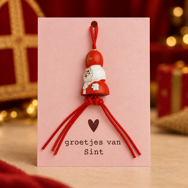 Roze kaartje Groetjes van Sint met Sintpoppetje